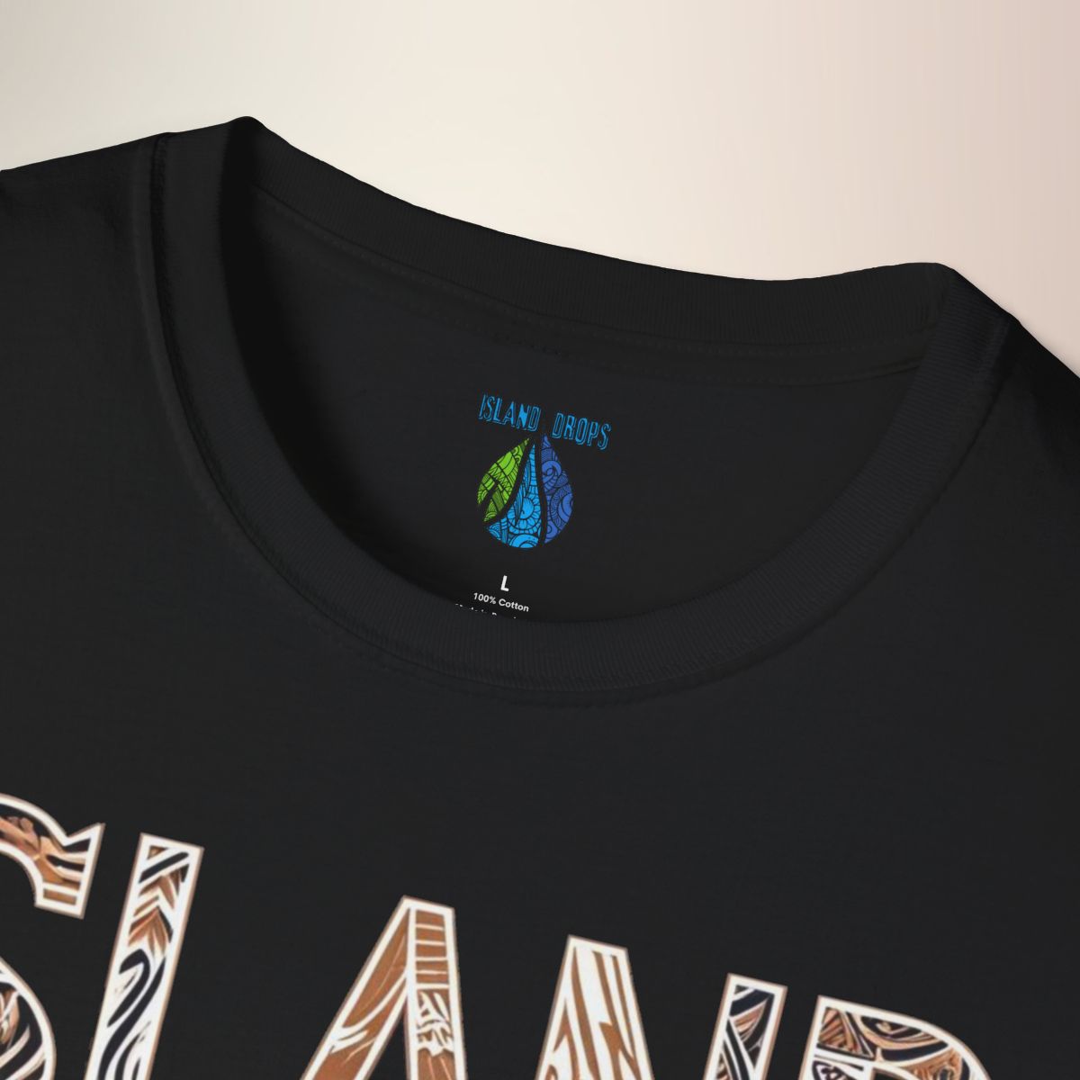 Black t-shirt with 'Island Drops' logo on the collar with graphic 'Island Born and Raised' text - Island Drops t-shirt collection | Unisex t-shirt