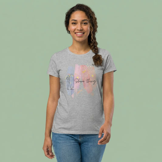 Woman wearing a gray women's cut t-shirt with 'Shore Thing' graphic design, surfboard and watercolor - Island Drops Women's collection | Women's cut t-shirt
