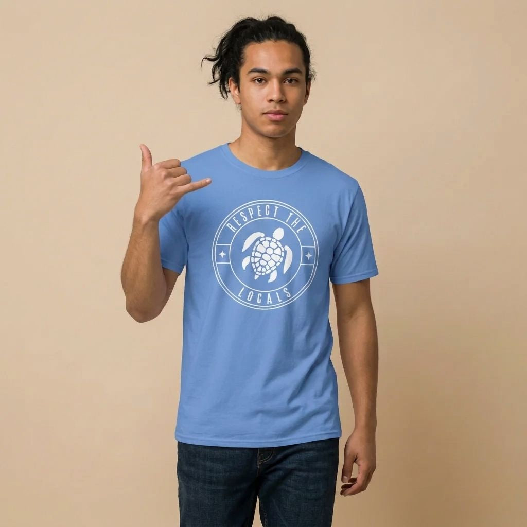 Person wearing a blue t-shirt  with 'RESPECT THE LOCALS' text and stylized turtle graphic design - Island Drops t-shirt collection | Unisex t-shirts
