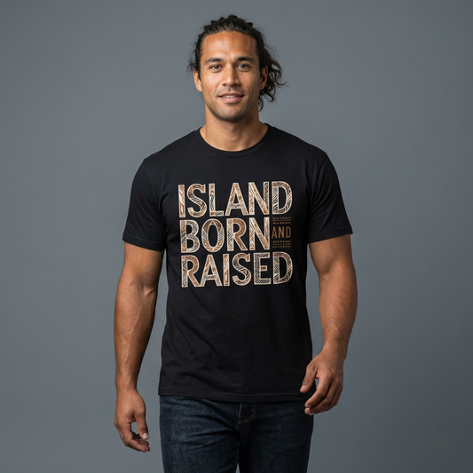 Man wearing a black t-shirt with graphic 'Island Born and Raised' text  - Island Drops t-shirt collection | Unisex t-shirt