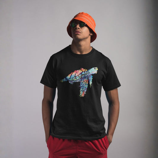 Person wearing a black t-shirt  with stylized watercolor turtle graphic design - Island Drops t-shirt collection | Unisex t-shirts
