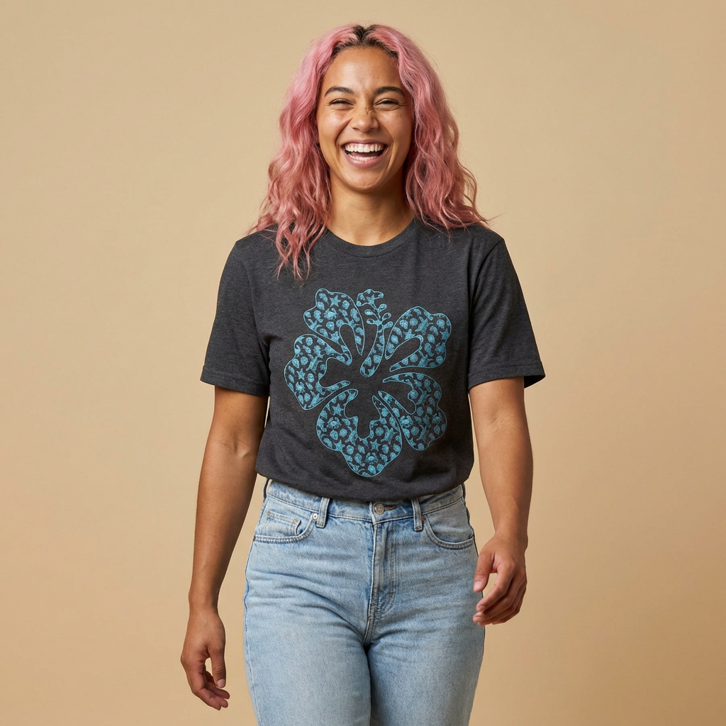 Person wearing a dark gray t-shirt with a stylized hibiscus graphic design - Island Drops t-shirt collection | Unisex t-shirt