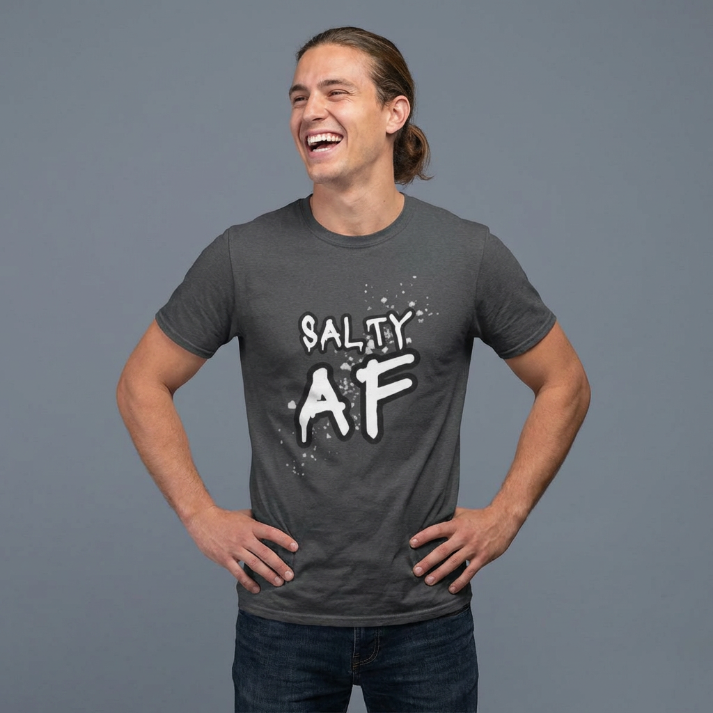 Person wearing a gray t-shirt  with 'SALTY AF' text and stylized salt graphic design - Island Drops t-shirt collection | Unisex t-shirts