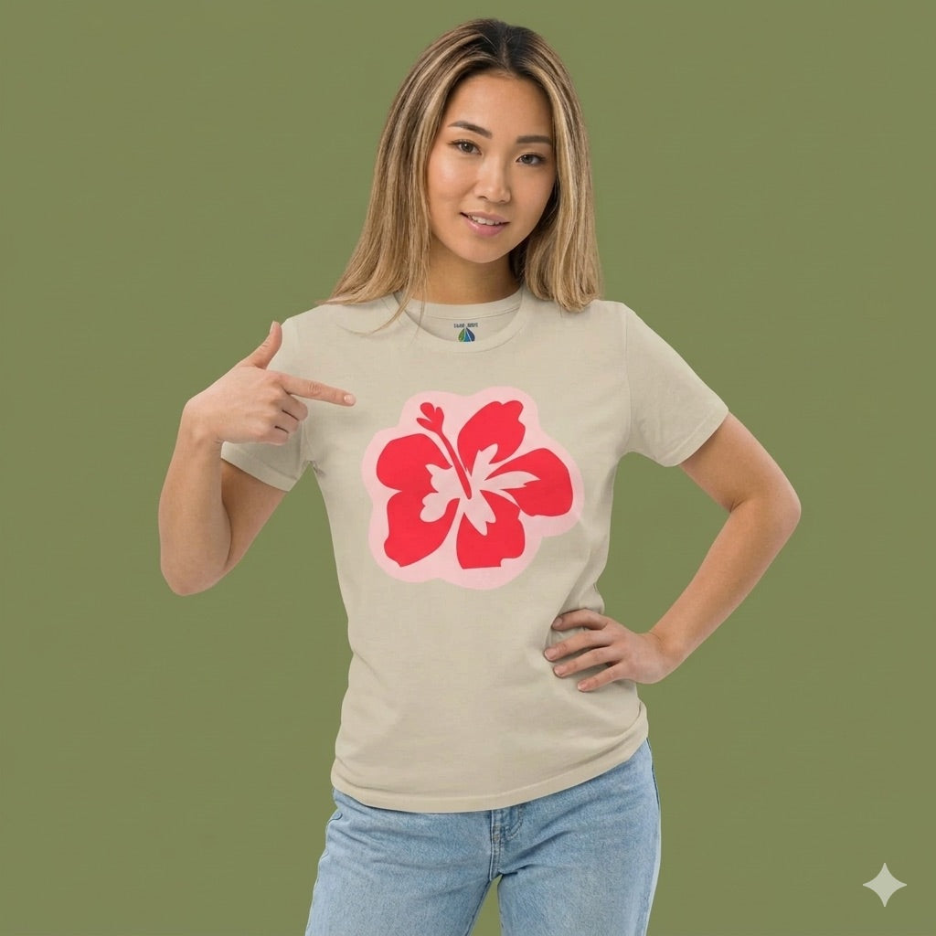 Woman wearing a beige t-shirt with a hibiscus graphic design  - Island Drops t-shirt collection | Unisex t-shirts