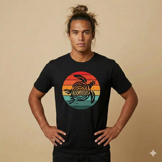 Man wearing a black t-shirt with sunset tribal turtle graphic design - Island Drops t-shirt collection | Unisex t-shirts