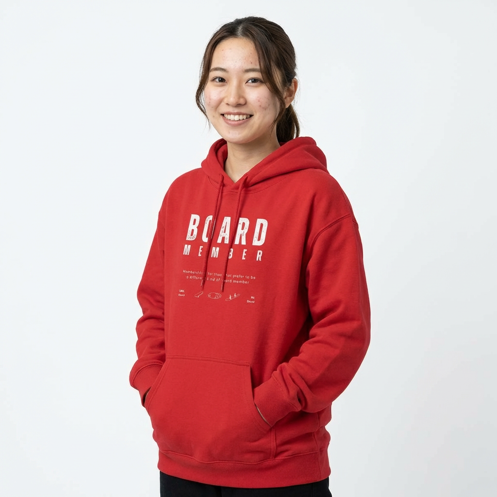 Person wearing a red hoodie with 'BOARD MEMBER' text , 100% BOARD, 0% BORED - Island Drops hoodie collection | Unisex pullover