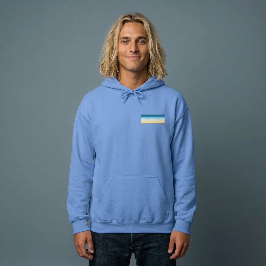 Man wearing a blue hoodie with a stylized beach graphic with 'MOOD:  BEACHY' text - Island Drops hoodie collection | Unisex pullover