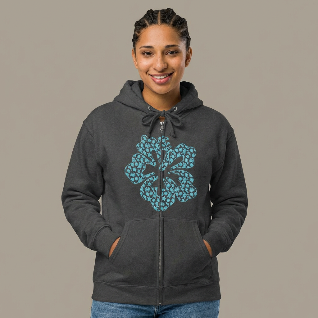 Person wearing a dark gray full zip hoodie with a stylized hibiscus graphic design - Island Drops hoodie collection | Unisex zipper hoodie