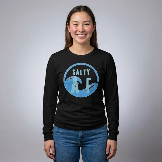 Person wearing a black long-sleeve shirt with 'Salty AF' graphic design - Island Drops long sleeve collection | Unisex shirts